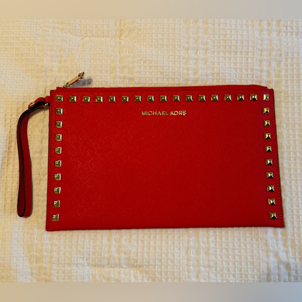 Michale Kors studded coral wristlet